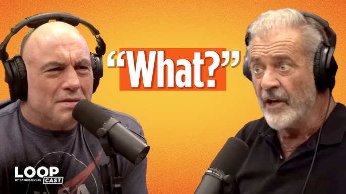 Two men wearing headphones speak into microphones against an orange background. The man on the left looks confused, while the man on the right appears surprised. Large text between them reads, What? in white letters.